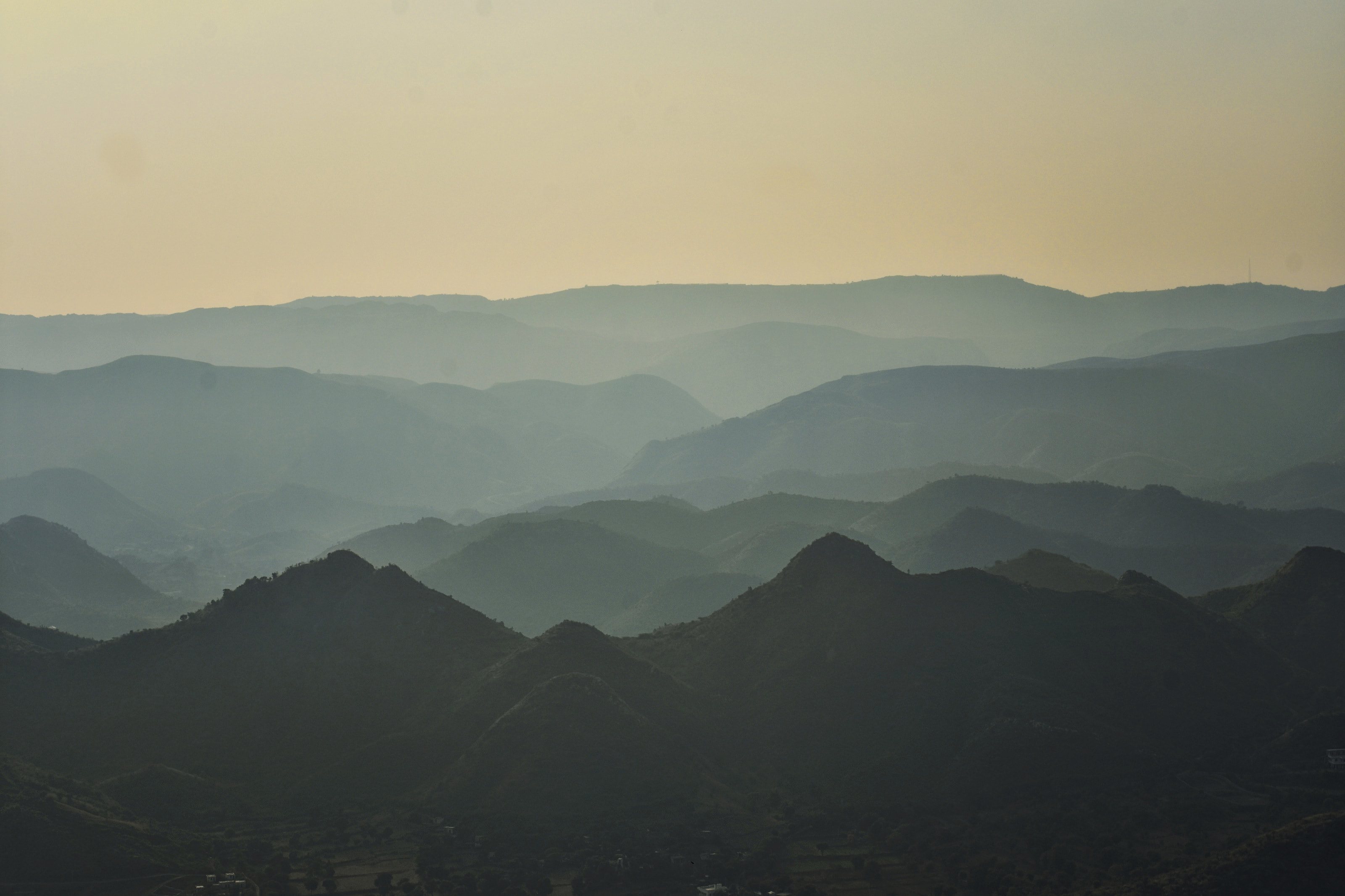 Layer after layer of mountain ridges fading into haze.